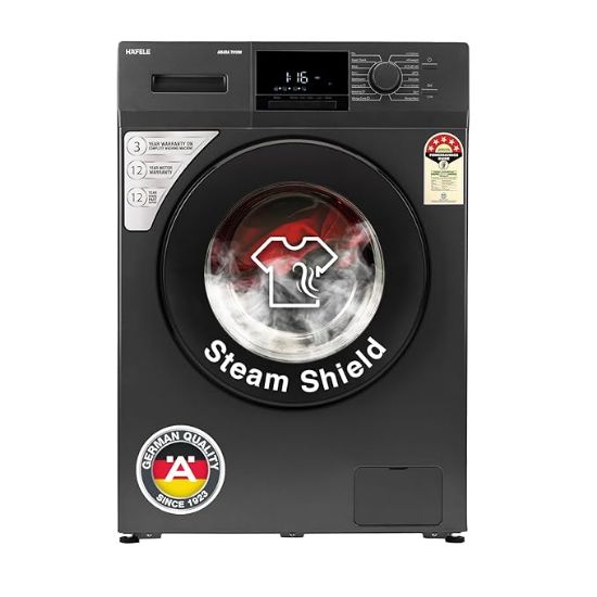 హఫెల్ అమారా 7 కిలోల 5 స్టార్, జర్మన్ టెక్నాలజీని ఉపయోగించి రూపొందించబడిన ప్రీమియం ఫుల్లీ ఆటోమేటిక్ ఫ్రంట్-లోడ్ వాషింగ్ మెషిన్, స్టీమ్ షీల్డ్ మరియు హెక్సా వాష్ డిజైన్‌తో వస్తుంది. యొక్క చిత్రం