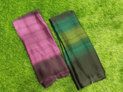 ఒక అందమైన పింక్-పర్పుల్ సారీ, ఇది గ్రాడియెంట్ లేదా ఒంబ్రే ఎఫెక్ట్‌తో ఉంటుంది, ఇది హాఫ్-అండ్-హాఫ్ సారీలా కనిపిస్తుంది. (ప్రతి ఒక్కటి 5.5 మీటర్లు) యొక్క చిత్రం