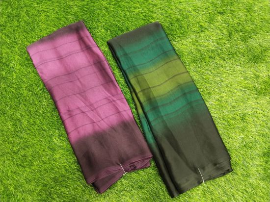 ఒక అందమైన పింక్-పర్పుల్ సారీ, ఇది గ్రాడియెంట్ లేదా ఒంబ్రే ఎఫెక్ట్‌తో ఉంటుంది, ఇది హాఫ్-అండ్-హాఫ్ సారీలా కనిపిస్తుంది. (ప్రతి ఒక్కటి 5.5 మీటర్లు) యొక్క చిత్రం