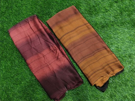 ఒక అందమైన పింక్-పర్పుల్ సారీ, ఇది గ్రాడియెంట్ లేదా ఒంబ్రే ఎఫెక్ట్‌తో ఉంటుంది, ఇది హాఫ్-అండ్-హాఫ్ సారీలా కనిపిస్తుంది. (ప్రతి ఒక్కటి 5.5 మీటర్లు) యొక్క చిత్రం