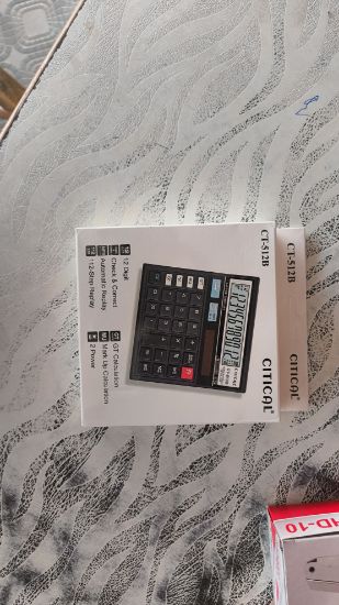 సిటికల్ CT-5128 కాలిక్యులేటర్, ఒక ప్రాథమిక ఎలక్ట్రానిక్ కాలిక్యులేటర్ యొక్క చిత్రం